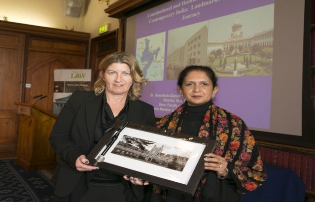 Pro. Ursula Kilkelly, Dean of law of UCC ,presenting the memento to Ambassador.